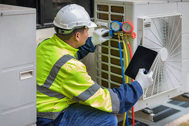 Professional Air Conditioning Repair technician working in Marion, IN
